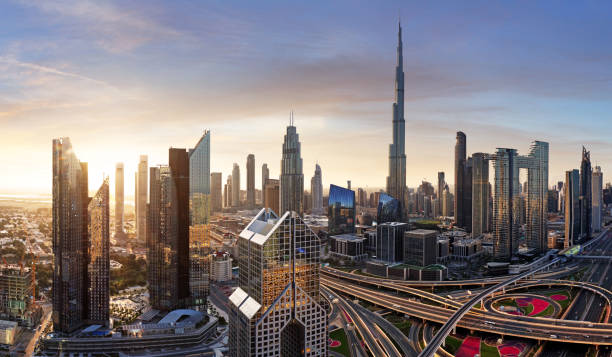 A panoramic view of a modern city skyline showcasing business opportunities in RAKEZ Free Zone at sunset.